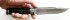 Нож Стрелок (дамасская сталь, эбен, латунь, серебрение) авторский  в руке