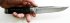 Нож Истребитель (дамасская сталь, эбен, латунь, серебрение) авторский в руке
