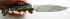 Нож Волк (сталь ДИ90-МП, карельская береза, композит, мельхиор литье)