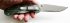 Нож складной Ontario RAT-1 сталь AUS-8 satin (камуфляж) в руке