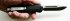 Нож автоматический Microtech Combat Troodon (drop-point, black) реплика в руке