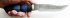 Нож Носорог (литой булат ламинированный дамаском, граб, мельхиор) в руке