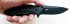 Нож складной Zedd (сталь AUS-8) Black Titanium в руке