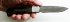 Нож складной Лиса-1 (дамаск, венге) в руке