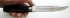 Нож айкути Оками (сталь Х12МФ ковка, дерево, кожа ската, серебрение, золочение) авторский в руке